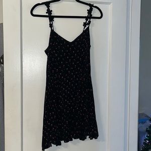 Super cute sundress with nice snatched waist but still flowing bottom. Cotton.